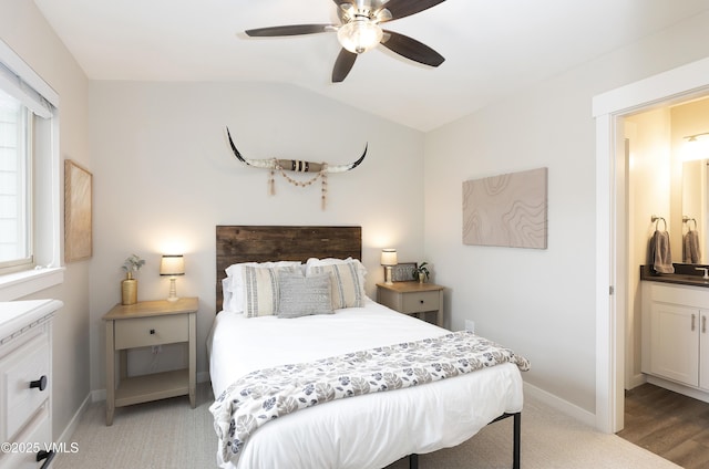 404 Chickadee Ln, Gypsum, CO 81637 - bedroom featuring vaulted ceiling, baseboards, a ceiling fan, and light carpet
