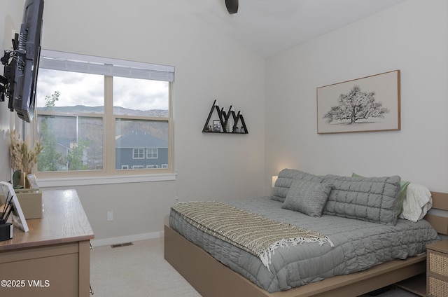 404 Chickadee Ln, Gypsum, CO 81637 - carpeted bedroom with lofted ceiling and baseboards