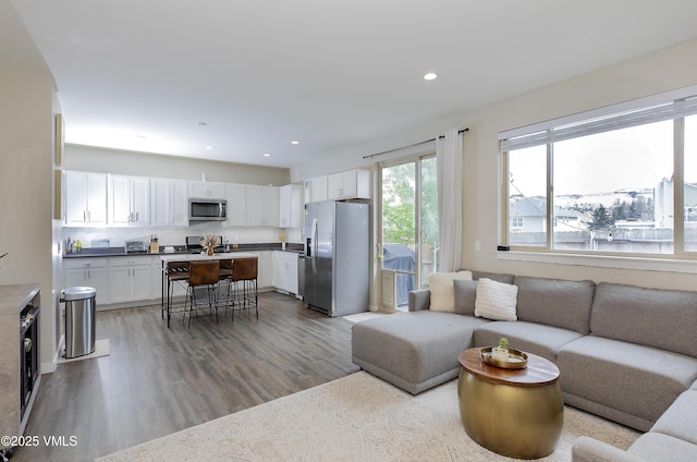 404 Chickadee Ln, Gypsum, CO 81637 - living room with wood finished floors and recessed lighting