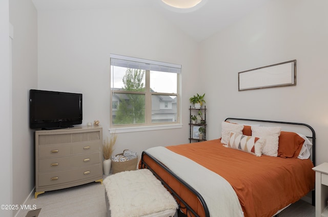 404 Chickadee Ln, Gypsum, CO 81637 - bedroom featuring vaulted ceiling, carpet flooring, and baseboards