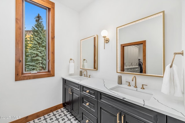 bathroom with vanity and a healthy amount of sunlight