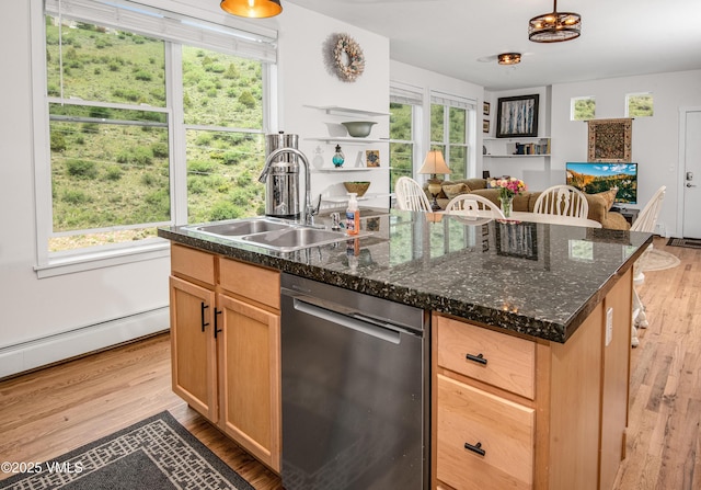511 Metcalf Rd Unit I27, Avon, CO 81620 - kitchen with dishwasher, a sink, an island with sink, light wood-style flooring, and a baseboard heating unit
