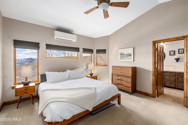 2960 June Creek Trl Unit A, Avon, CO 81620 - bedroom with a wall mounted air conditioner, light carpet, lofted ceiling, ensuite bath, and a ceiling fan