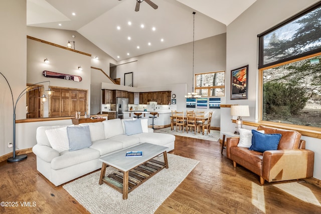 2960 June Creek Trl Unit A, Avon, CO 81620 - living area featuring high vaulted ceiling, ceiling fan, wood finished floors, and recessed lighting