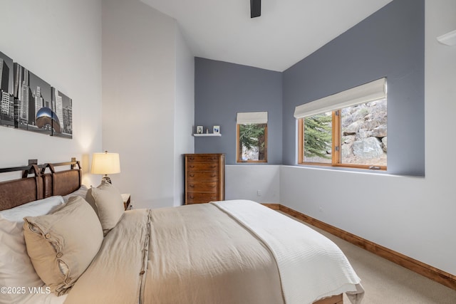 2960 June Creek Trl Unit A, Avon, CO 81620 - bedroom with carpet flooring, vaulted ceiling, and a ceiling fan
