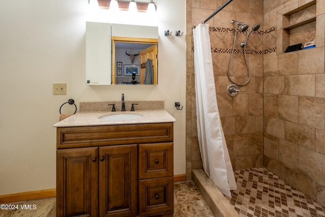 bathroom featuring vanity and a shower with curtain