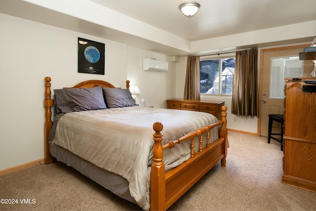 carpeted bedroom with an AC wall unit