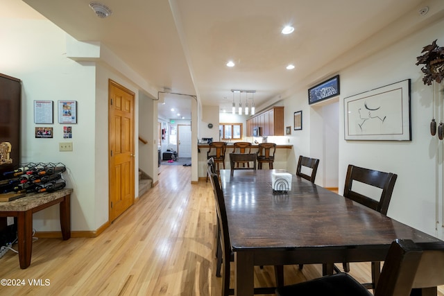 dining room with light hardwood / wood-style floors