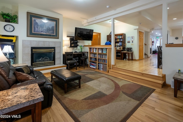 living room featuring hardwood / wood-style floors and a fireplace