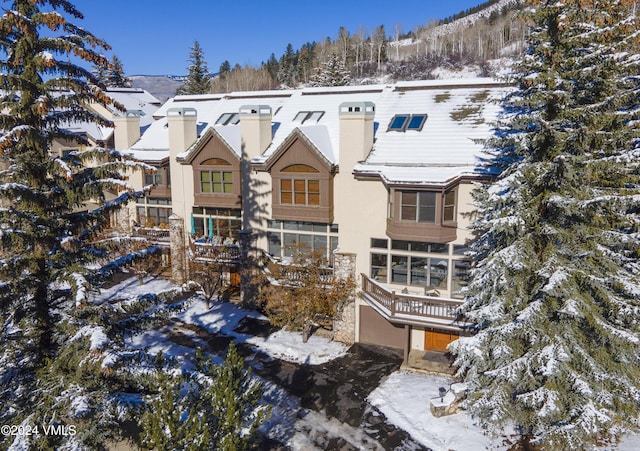 exterior space featuring a mountain view