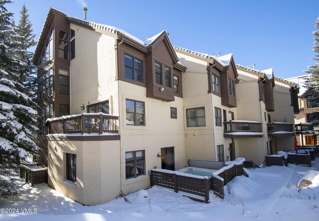 view of snow covered property