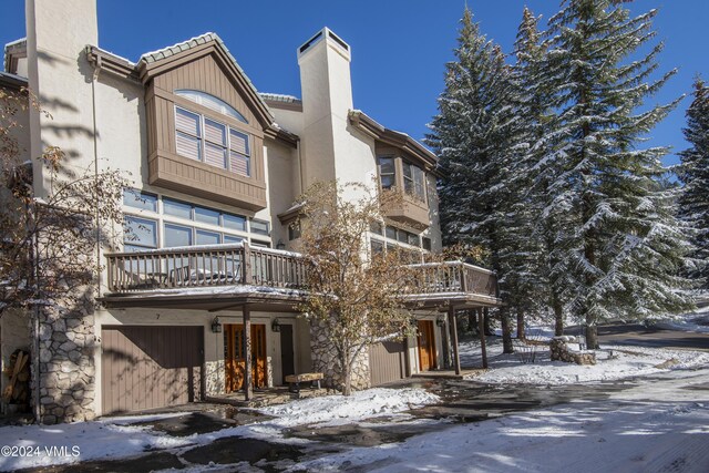 view of snow covered property