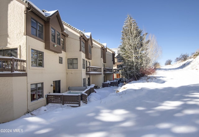 view of snow covered property