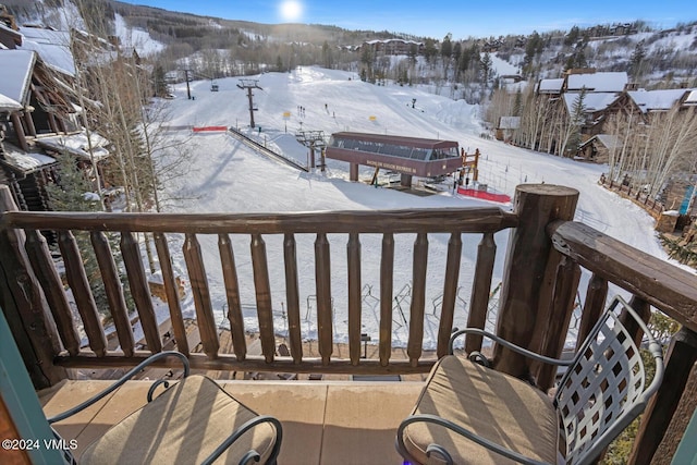 view of snow covered deck