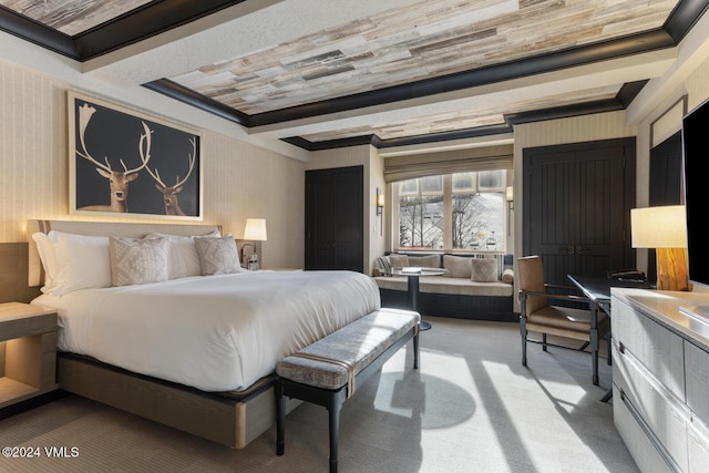 bedroom with crown molding and carpet flooring