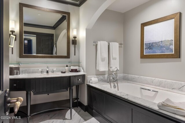 bathroom featuring vanity and a bathtub