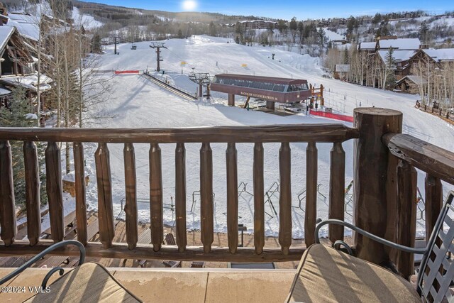 view of snow covered deck