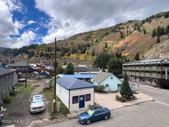 drone / aerial view featuring a mountain view