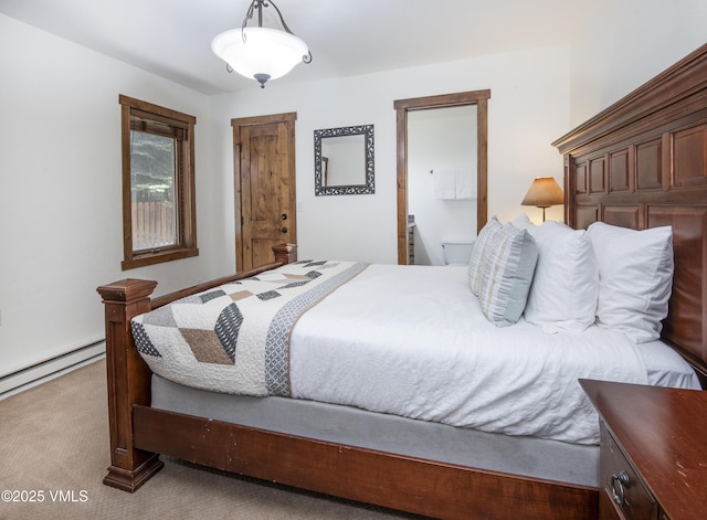 83 Larkspur Ln Unit A, Avon, CO 81620 - bedroom with carpet and a baseboard heating unit