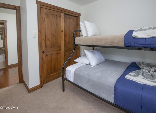 83 Larkspur Ln Unit A, Avon, CO 81620 - bedroom featuring baseboards and light carpet