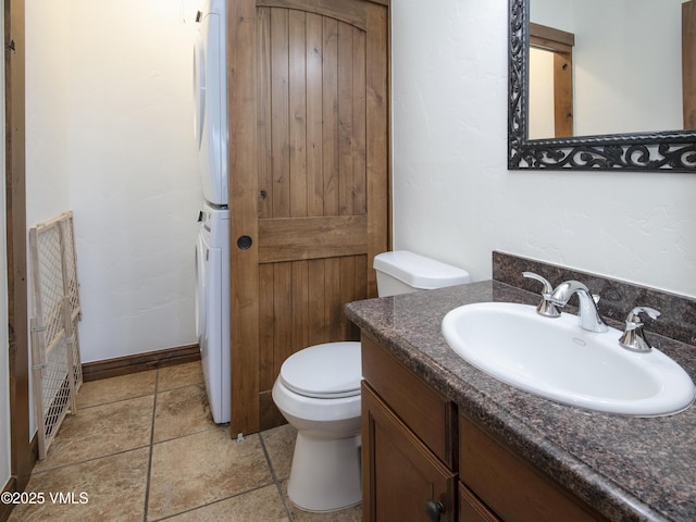 83 Larkspur Ln Unit A, Avon, CO 81620 - bathroom with stacked washing machine and dryer and vanity