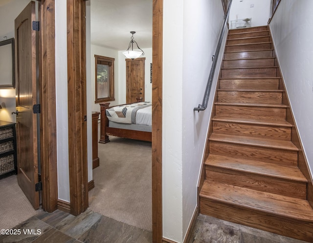 83 Larkspur Ln Unit A, Avon, CO 81620 - staircase featuring baseboards