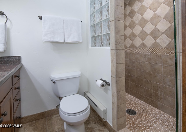83 Larkspur Ln Unit A, Avon, CO 81620 - bathroom featuring a baseboard heating unit, a walk in shower, and vanity