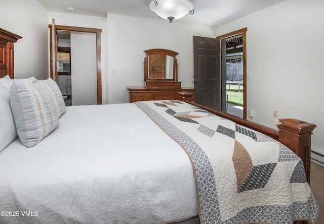 83 Larkspur Ln Unit A, Avon, CO 81620 - bedroom featuring access to outside and carpet