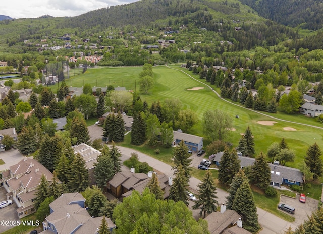 83 Larkspur Ln Unit A, Avon, CO 81620 - aerial perspective of suburban area featuring mountains and a golf course
