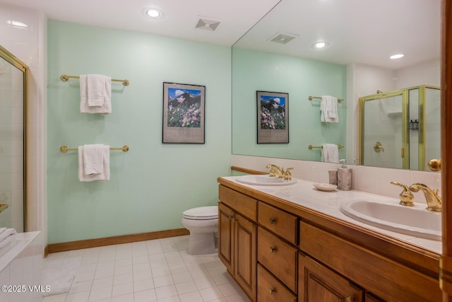 74 Cresta Rd Unit 110, Edwards, CO 81632 - bathroom with a shower stall, double vanity, and recessed lighting