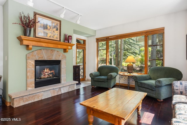 74 Cresta Rd Unit 110, Edwards, CO 81632 - living room with a fireplace, hardwood / wood-style floors, and track lighting