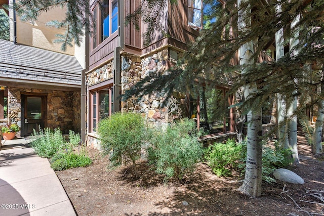 74 Cresta Rd Unit 110, Edwards, CO 81632 - view of side of property featuring stone siding