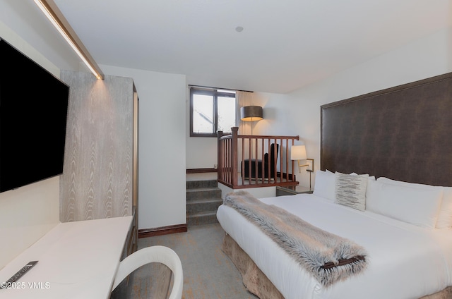 26 Avondale Ln Unit 104-H, Beaver Creek, CO 81620 - bedroom with carpet floors and baseboards