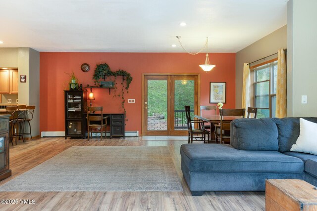 445 Pine St, Red Cliff, CO 81649 - living area featuring wood finished floors, recessed lighting, and a baseboard heating unit