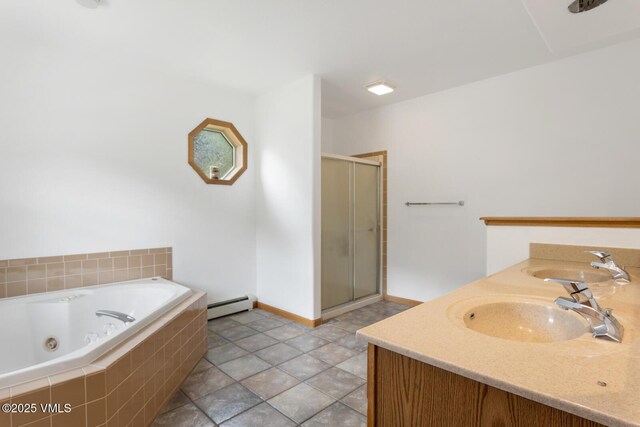 445 Pine St, Red Cliff, CO 81649 - full bathroom with a baseboard heating unit, a shower stall, a whirlpool tub, and double vanity