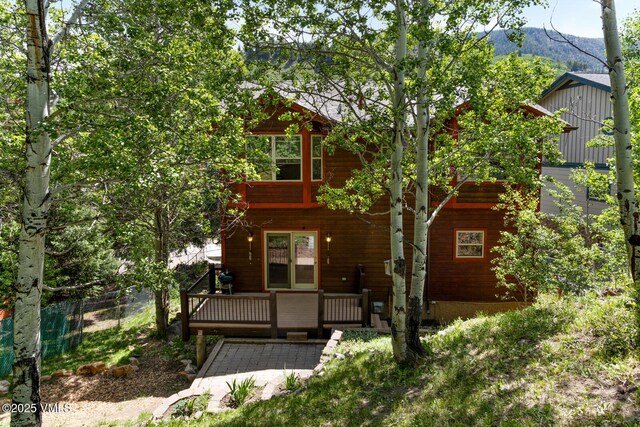 445 Pine St, Red Cliff, CO 81649 - view of front of property with a deck with mountain view