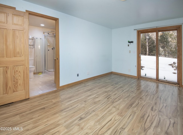 unfurnished room featuring light hardwood / wood-style floors