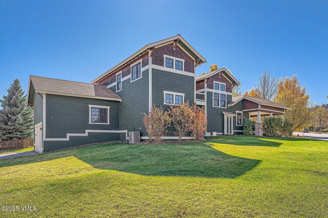 50 Bunker Way, Eagle, CO 81631 - rear view of house featuring central AC and a yard