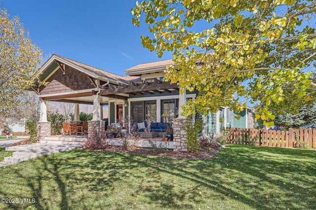 50 Bunker Way, Eagle, CO 81631 - back of house with a yard, fence, and a pergola