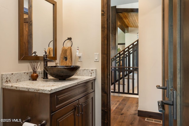 620 Jouflas Ranch Rd, Wolcott, CO 81655 - bathroom with vanity, wood finished floors, and wooden ceiling