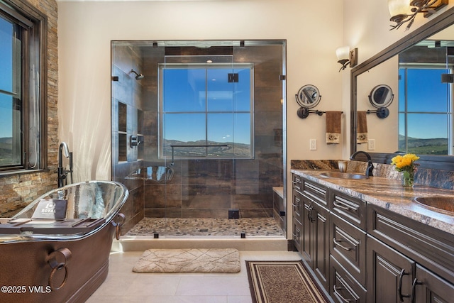 620 Jouflas Ranch Rd, Wolcott, CO 81655 - full bath featuring a shower stall, double vanity, and tile patterned flooring