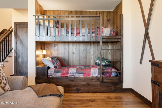 620 Jouflas Ranch Rd, Wolcott, CO 81655 - bedroom with wood finished floors and wood walls
