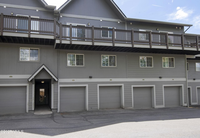 175 Hurd Ln Unit 3101, Avon, CO 81620 - back of house with a balcony and an attached garage