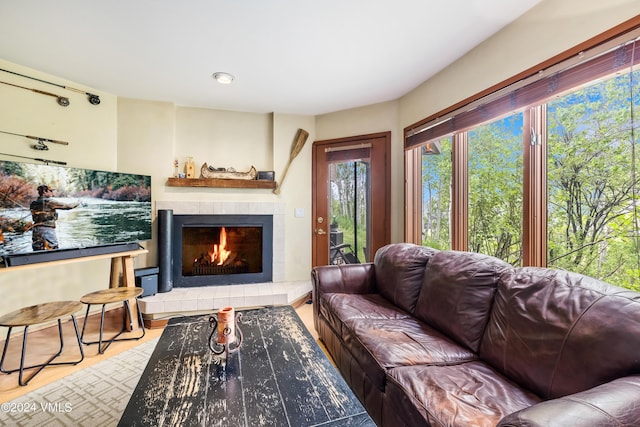 411 Eagle Dr Unit 10, Eagle-Vail, CO 81620 - living area with a tiled fireplace and wood finished floors