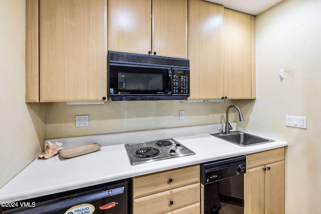 411 Eagle Dr Unit 10, Eagle-Vail, CO 81620 - kitchen featuring black appliances, light brown cabinetry, and a sink