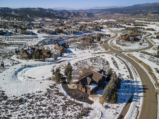 93 S Penstemon Ln, Eagle, CO 81631 - snowy aerial view with a mountain view and a residential view
