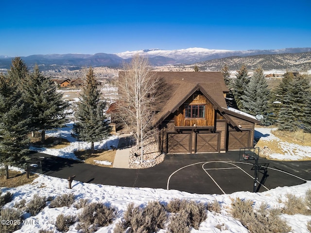 93 S Penstemon Ln, Eagle, CO 81631 - exterior space featuring an attached garage and a mountain view