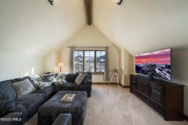 93 S Penstemon Ln, Eagle, CO 81631 - living room with lofted ceiling with beams, light carpet, track lighting, and baseboards