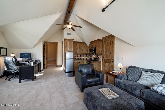 93 S Penstemon Ln, Eagle, CO 81631 - living area with lofted ceiling with beams, light carpet, a ceiling fan, and visible vents