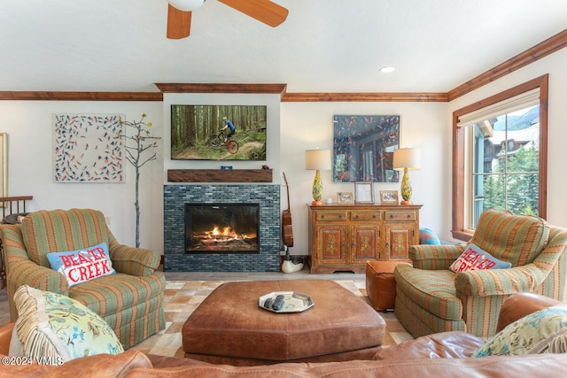 living room featuring crown molding and ceiling fan